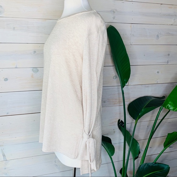 SOLD! Light Cream Colored Soft Knit Top with Cute Detailing Around Wrist - Picture 4 of 6